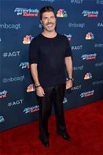 Unveiling the Height of Simon Cowell: How Tall Is He Really?